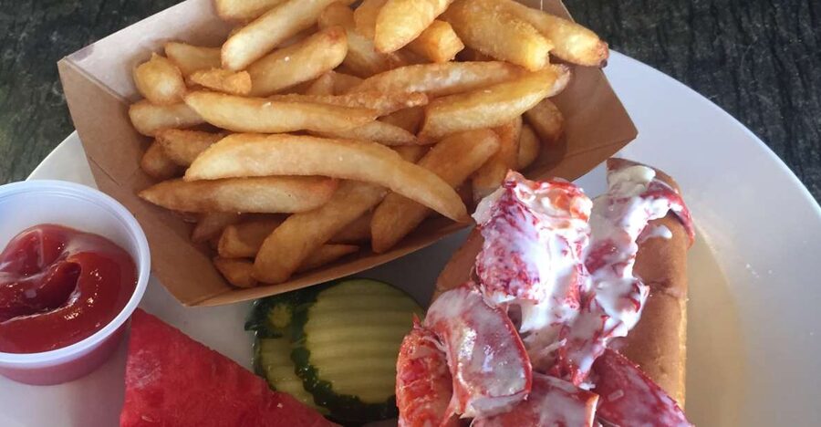 Boston: Seafood Tasting & Historical Walking Tour - Waterfront tasting and Harborwalk views, plus chowder that earns its brag